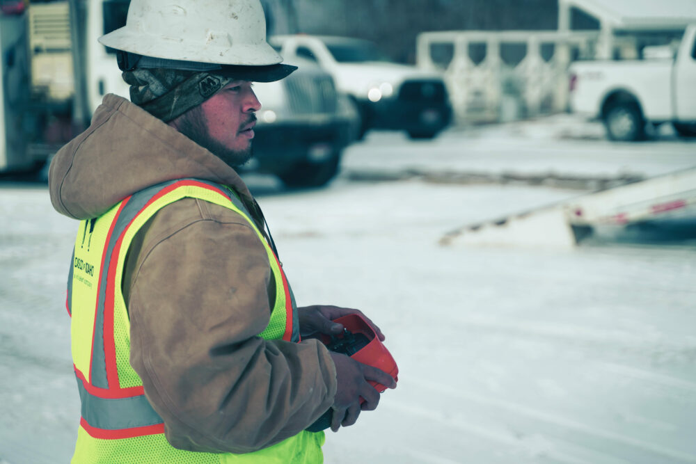 Utility Contractor Operating A Drill